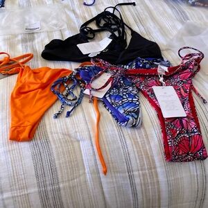 Mini side tie bikini bottoms and triangle wrap around bikini